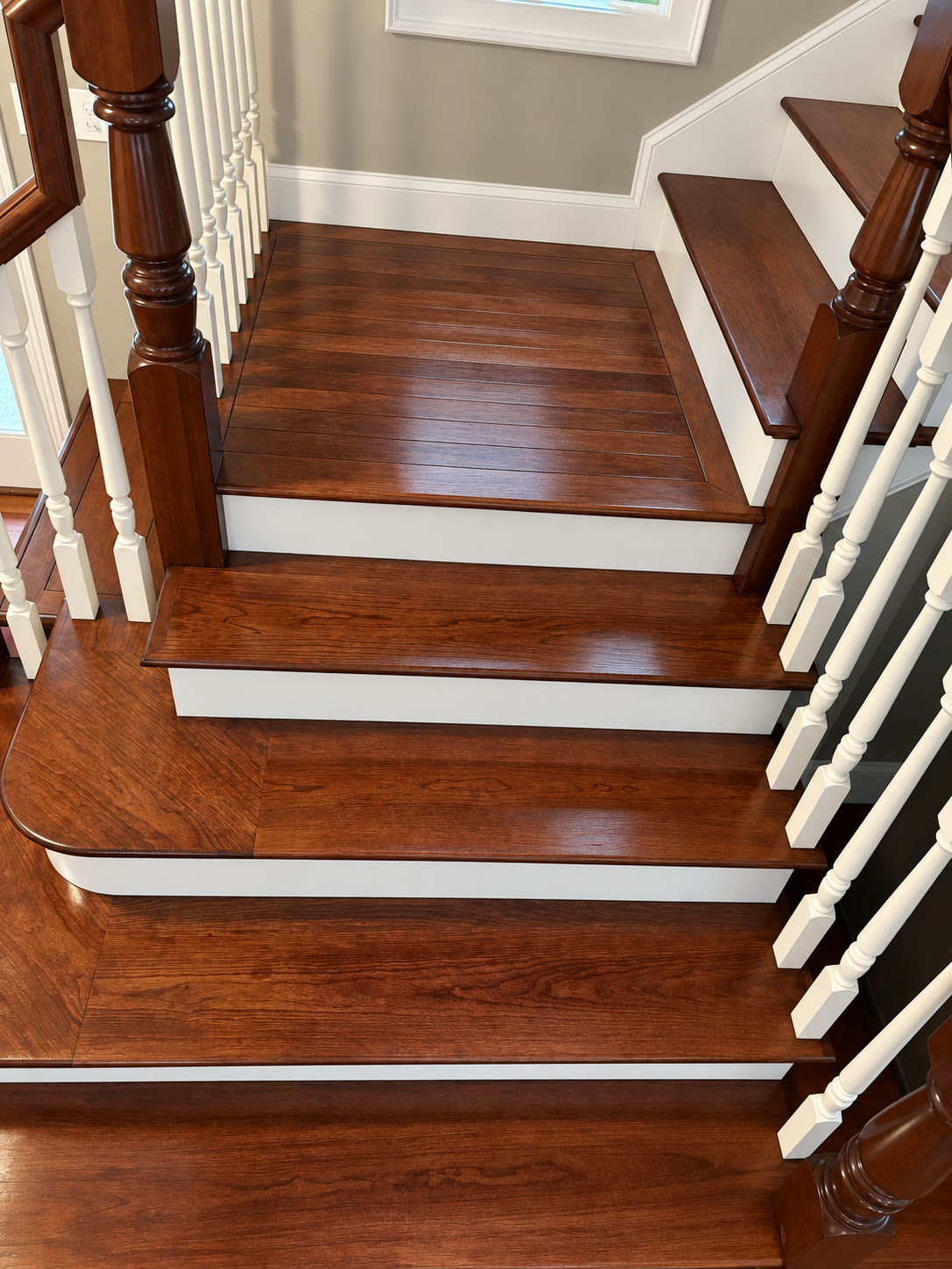 Overhead view of refinished staircase treads and landing